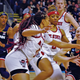 UConn’s Paige Bueckers fends off #1 seed N.C. State’s furious defense.